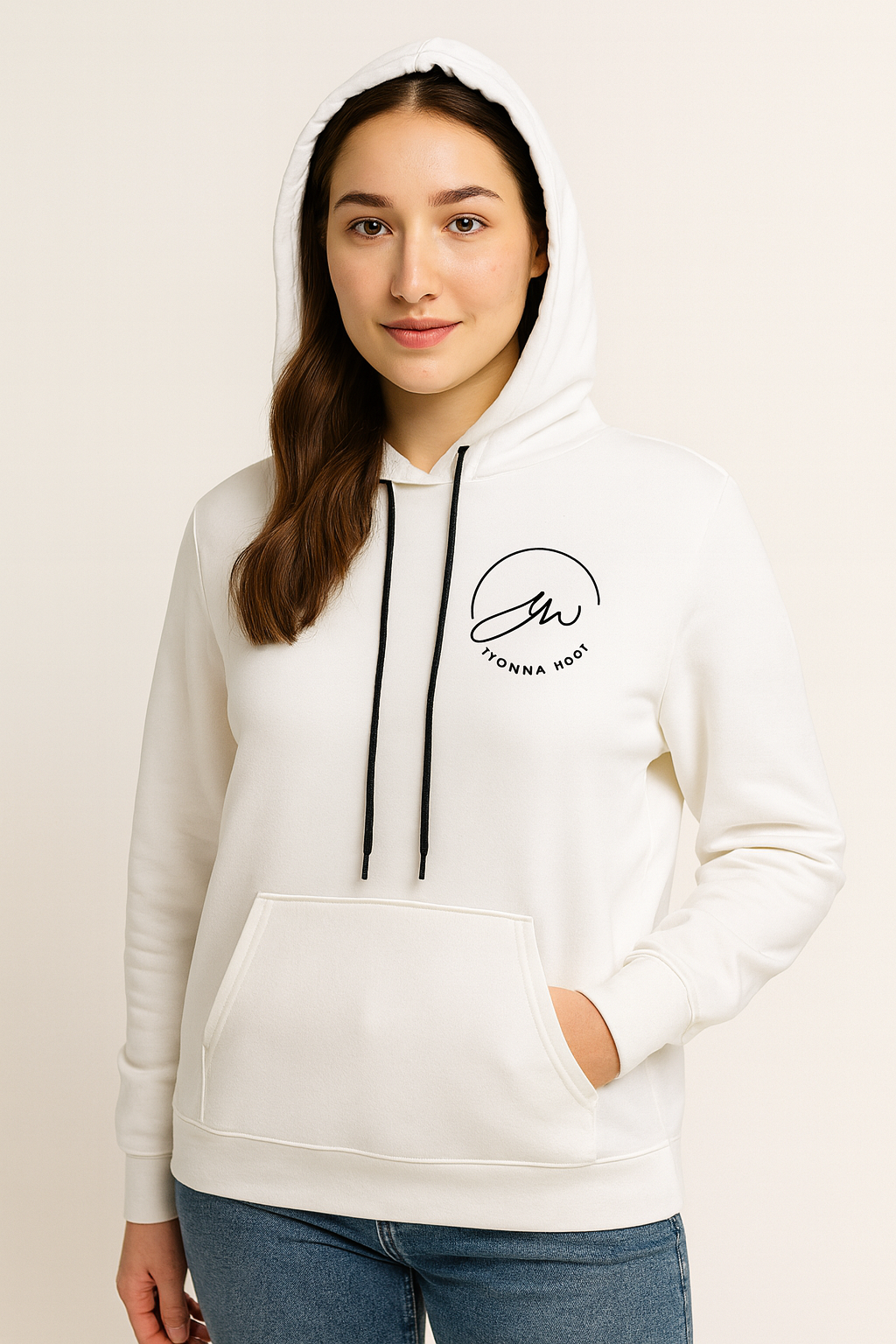Woman wearing a white hoodie with a logo on a plain background
